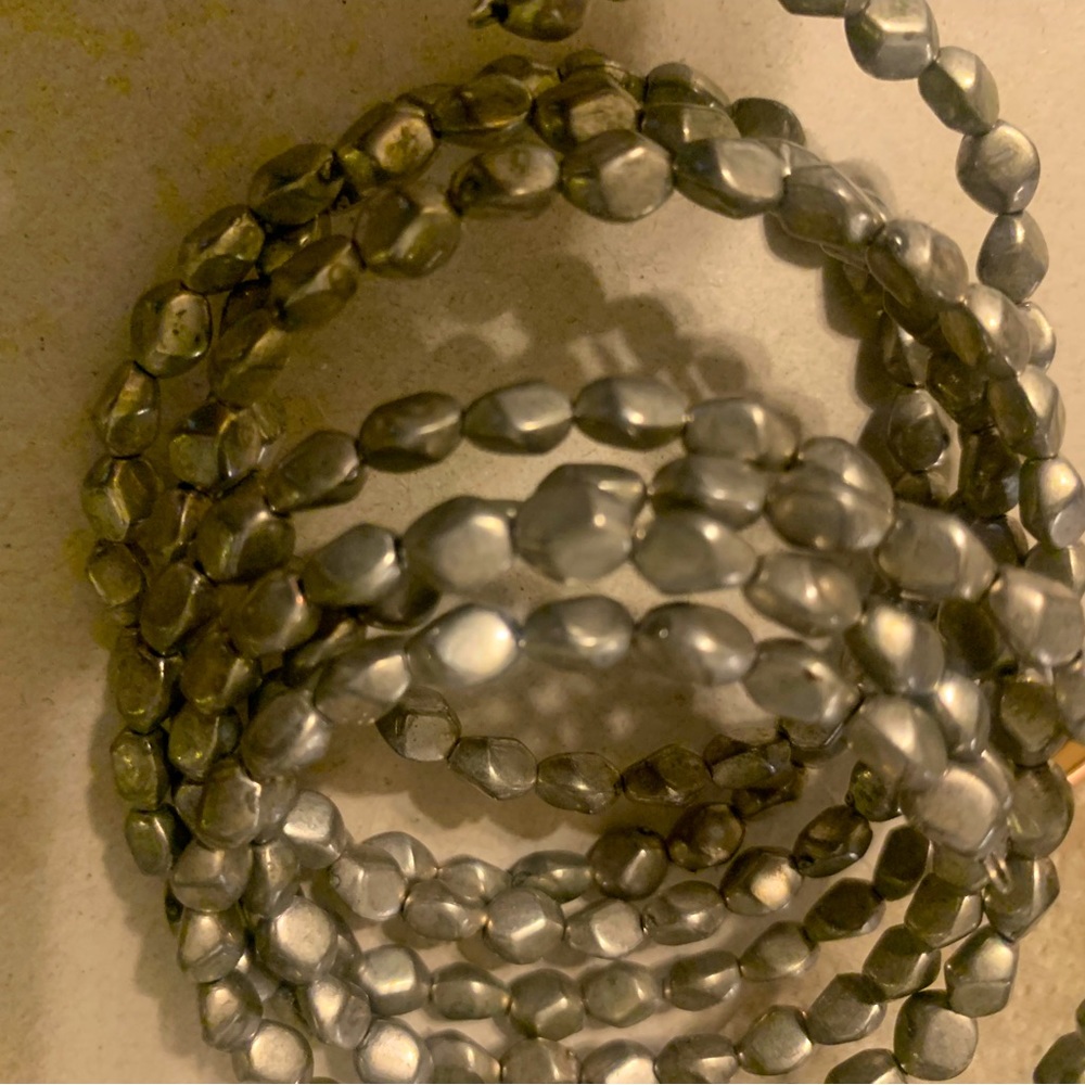 Silver toned wrap braclet. Great condition- have had a while but never wear 2/20